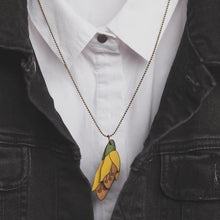 Load image into Gallery viewer, Kowhai flower rimu necklace on model