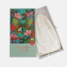 Load image into Gallery viewer, Magnolia and Moth 1000 jigsaw puzzle by FLOX showing storage bag

